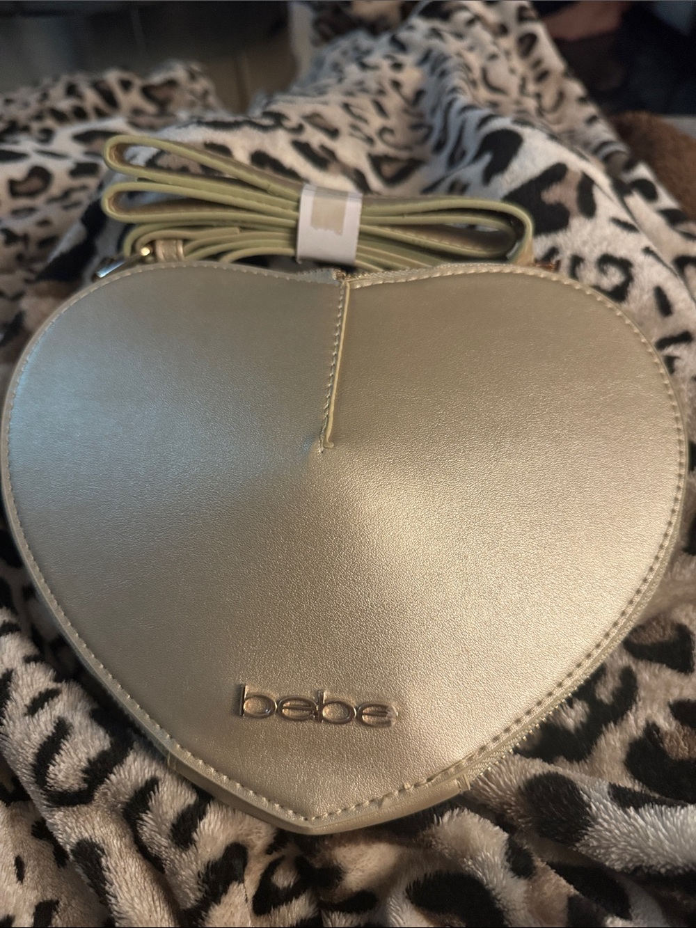bebe Heart-Shaped Mini Crossbody Bag in Gold